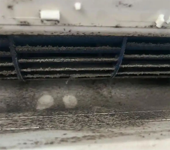 山南市空调吹的风有股烧焦味是怎么回事